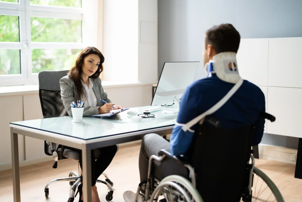 An attorney speaking with a personal injury claimant.